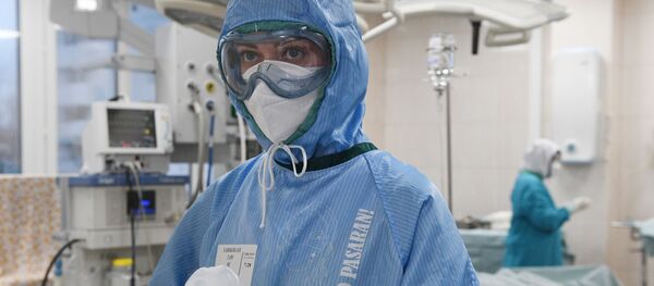 Медицинский работник в операционной ковид-госпиталя, организованного в городской клинической больнице No15 имени О. М. Филатова в Москве - 俄罗斯卫星通讯社