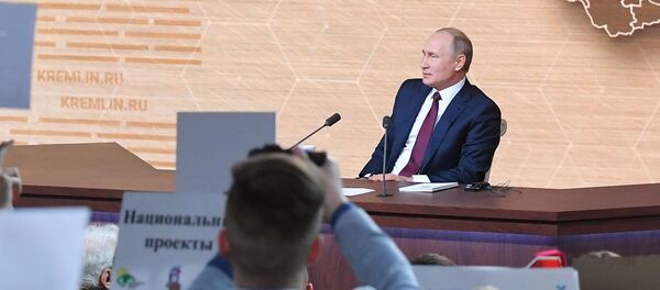 Президент РФ Владимир Путин на большой ежегодной пресс-конференции в Центре международной торговли на Красной Пресне - 俄羅斯衛星通訊社