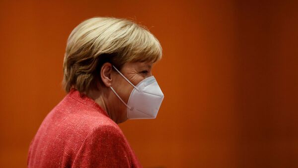 Канцлер Германии Ангела Меркель в защитной маске в Берлине  - 俄罗斯卫星通讯社