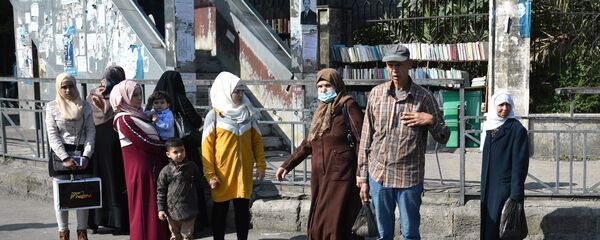 Местные жители на одной из улиц города Дамаска - 俄罗斯卫星通讯社