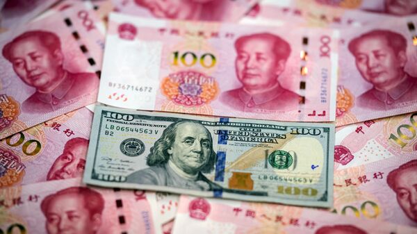 Китайский юань и американский доллар - 俄罗斯卫星通讯社