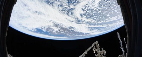 Вид на Землю из иллюминатора МКС - 俄罗斯卫星通讯社