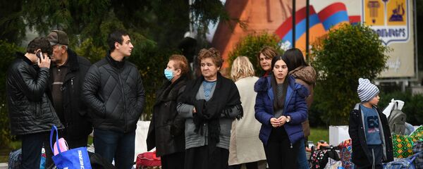 Беженцы, вернувшиеся домой в Степанакерт. Беженцы, вернувшиеся домой в Степанакерт. - 俄罗斯卫星通讯社