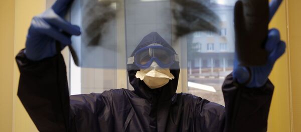 Медицинский работник в ковид-госпитале, организованном в центральной районной больнице в городе Шебекино в Белгородской области. - 俄罗斯卫星通讯社