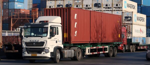 Грузовик в порту. Китай Грузовик в порту. Китай - 俄罗斯卫星通讯社