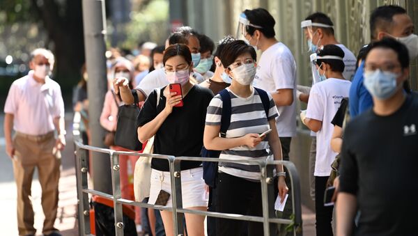 Люди в очереди на тестирование в Гонконге - 俄羅斯衛星通訊社