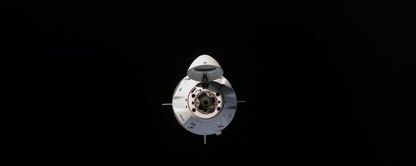 Космический корабль Crew Dragon перед стыковкой с Международной космической станцией - 俄羅斯衛星通訊社