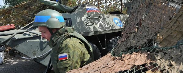 Российский миротворец на блокпосту, расположенном на въезде в город Бендеры - 俄羅斯衛星通訊社
