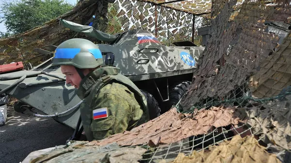 Российский миротворец на блокпосту, расположенном на въезде в город Бендеры - 俄羅斯衛星通訊社