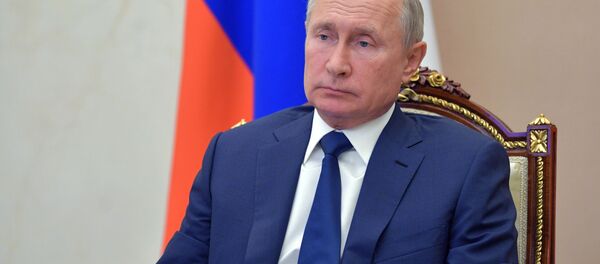 30 ноября 2020. Президент РФ Владимир Путин во время встречи в режиме видеоконференции с главой Республики Бурятия Алексеем Цыденовым.  - 俄罗斯卫星通讯社