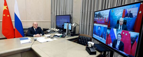 2 декабря 2020. Председатель правительства РФ Михаил Мишустин на 25-й регулярной встрече глав правительств России и КНР, проходящей в режиме видеоконференции. 2 декабря 2020. Председатель правительства РФ Михаил Мишустин на 25-й регулярной встрече глав правительств России и КНР, проходящей в режиме видеоконференции. - 俄羅斯衛星通訊社