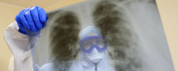 Медицинский работник ковид-госпиталя, организованного в центральной районной больнице в городе Шебекино в Белгородской области. - 俄羅斯衛星通訊社