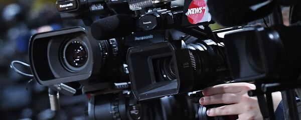 Журналисты  - 俄羅斯衛星通訊社