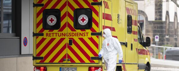 Машина скорой помощи у университетской больницы в Дрездене, Германия Машина скорой помощи у университетской больницы в Дрездене, Германия - 俄羅斯衛星通訊社