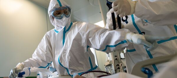 Медицинские сотрудники в отделении реанимации и интенсивной терапии городской клинической больницы № 15 имени О. М. Филатова в Москве. Медицинские сотрудники в отделении реанимации и интенсивной терапии городской клинической больницы № 15 имени О. М. Филатова в Москве. - 俄罗斯卫星通讯社