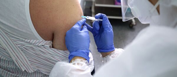 Вакцинация от коронавируса пациента в городской поликлинике №4 в Волгограде. - 俄罗斯卫星通讯社