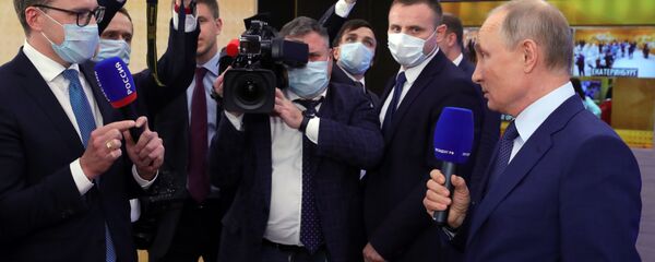 17 декабря 2020. Президент РФ Владимир Путин во время общения с журналистами после большой ежегодной пресс-конференции.  - 俄罗斯卫星通讯社