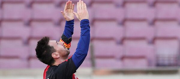 November 29, 2020 FC Barcelona's Lionel Messi celebrates scoring their fourth goal wearing a Newell's Old Boys shirt in reference to former player Diego Maradona - 俄罗斯卫星通讯社