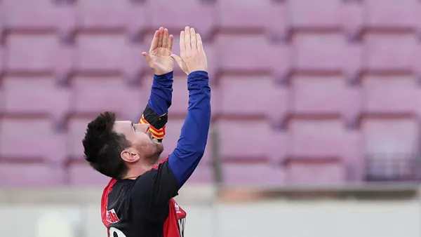 November 29, 2020 FC Barcelona's Lionel Messi celebrates scoring their fourth goal wearing a Newell's Old Boys shirt in reference to former player Diego Maradona - 俄羅斯衛星通訊社