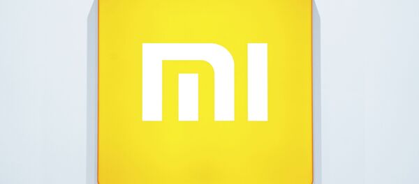 Логотип компании Xiaomi  - 俄罗斯卫星通讯社