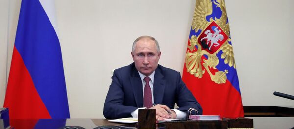 30 декабря 2020. Президент РФ Владимир Путин проводит в режиме видеоконференции совещание с председателем правительства РФ Михаилом Мишустиным по вопросу развития транспортной инфраструктуры. 30 декабря 2020. Президент РФ Владимир Путин проводит в режиме видеоконференции совещание с председателем правительства РФ Михаилом Мишустиным по вопросу развития транспортной инфраструктуры. - 俄罗斯卫星通讯社