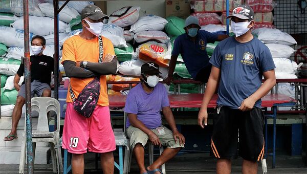 Местные жители в масках. Манила. Филиппины  - 俄羅斯衛星通訊社