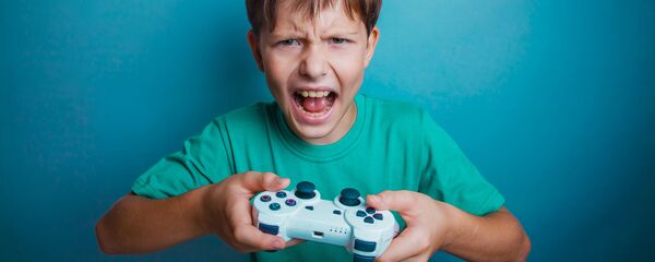 Ребенок с игровой приставкой - 俄罗斯卫星通讯社