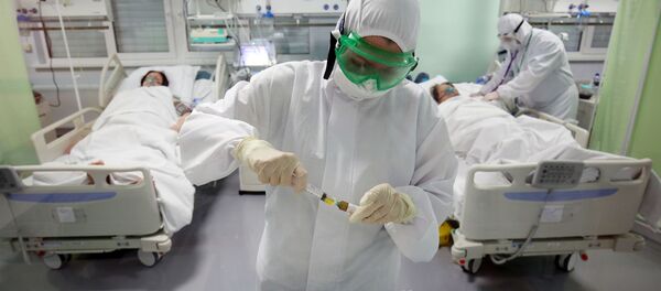 Медицинские работники в реанимационном отделении Волгоградской областной инфекционной больницы №2 в городе Волжский. - 俄羅斯衛星通訊社