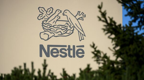 Логотип швейцарской транснациональной корпорации и крупнейшего в мире производителя продуктов питания компании Nestle - 俄羅斯衛星通訊社