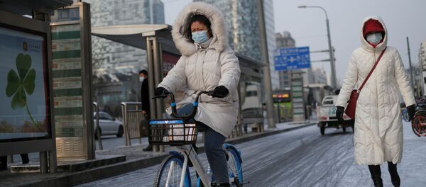 Женщина в маске. Пекин - 俄羅斯衛星通訊社