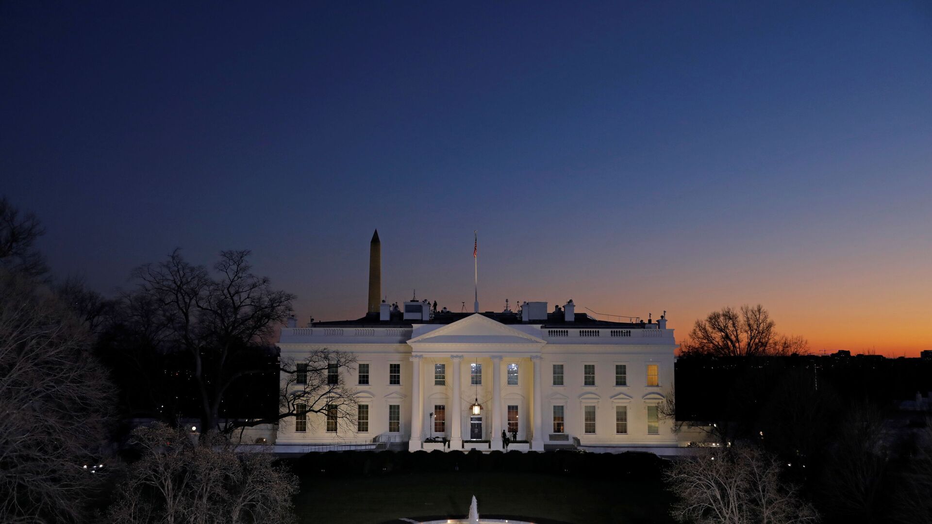 The sun sets near the White House on the final night of Donald Trump's presidency, ahead of U.S. President-elect Joe Biden's inauguration, in Washington, U.S., January 19, 2021. - 俄羅斯衛星通訊社, 1920, 15.02.2021