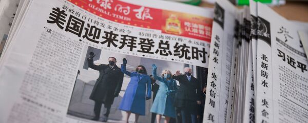 Заголовки китайских новостных лент после инаугурации Джо Байдена.  - 俄罗斯卫星通讯社