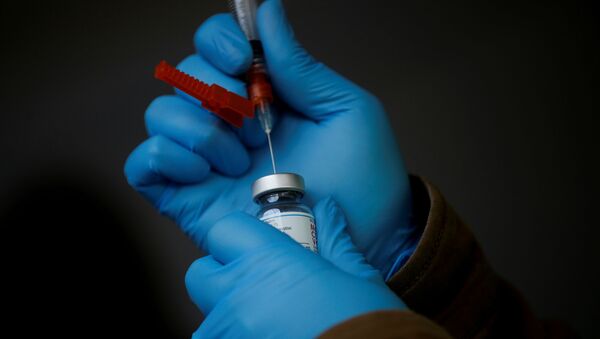 美國監管部門建議暫停使用強生新冠疫苗 - 俄羅斯衛星通訊社