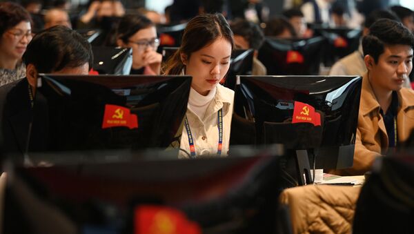 Представители вьетнамских СМИ работают во время открытия 13-го Национального конгресса Коммунистической партии Вьетнама - 俄罗斯卫星通讯社