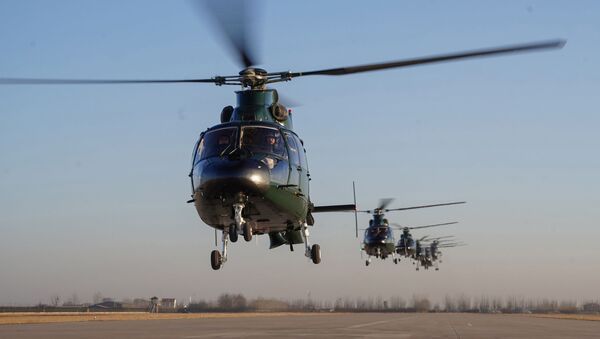 Группа ударных вертолетов Z-9 во время выполнения учебно-летной миссии в начале января. Китай - 俄罗斯卫星通讯社