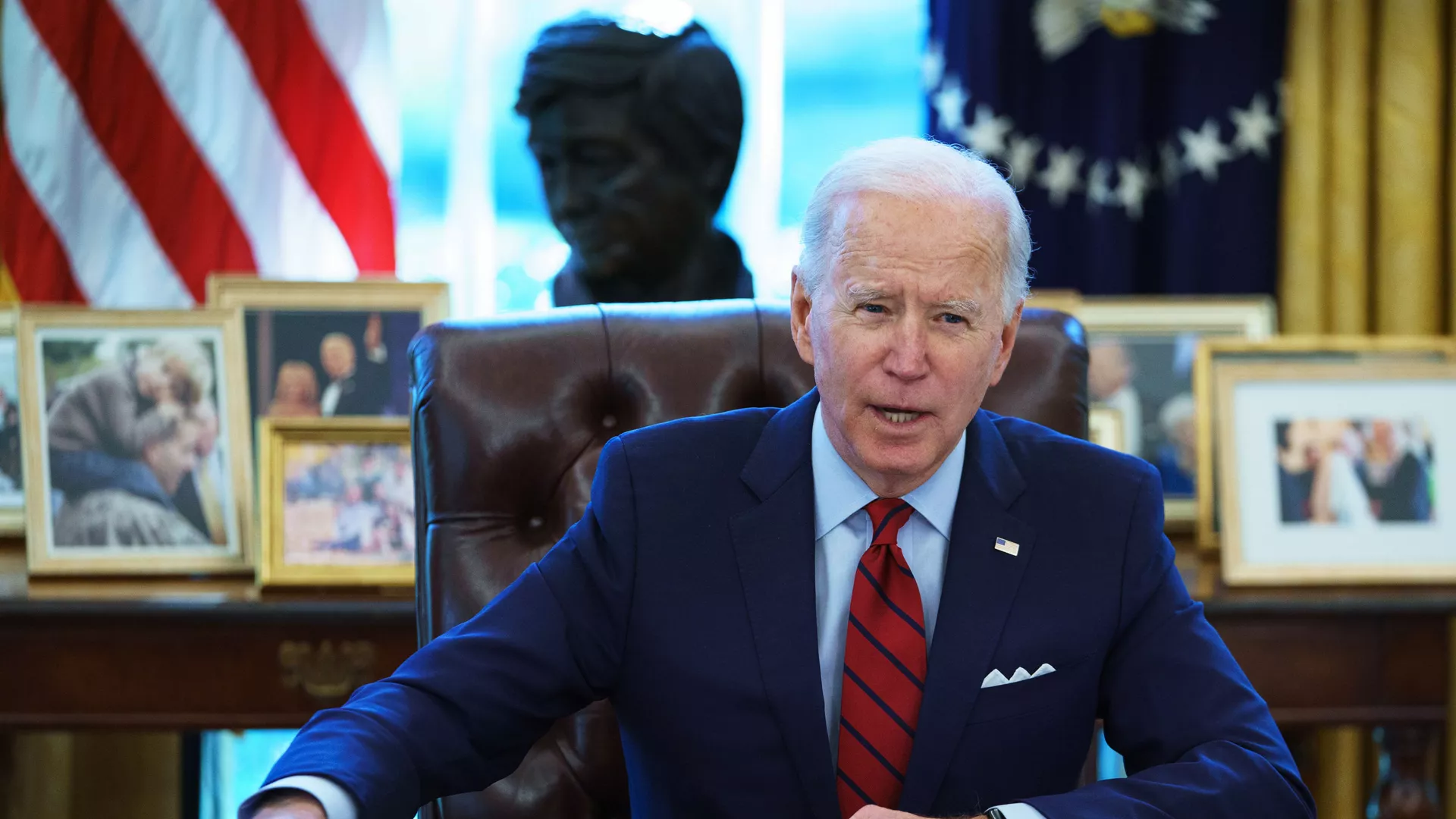 US President Joe Biden speaks before signing executive orders on health care, in the Oval Office of the White House in Washington, DC, on January 28, 2021. 