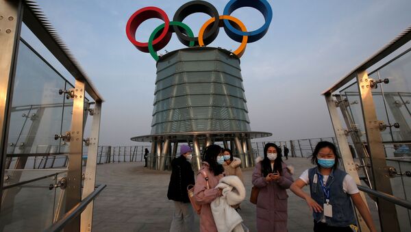 Олимпийские кольца на олимпийской башне в Пекине  - 俄罗斯卫星通讯社