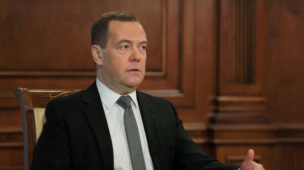 Заместитель председателя Совета безопасности РФ Дмитрий Медведев во время интервью российским СМИ - 俄羅斯衛星通訊社