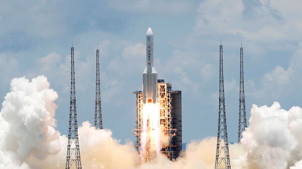 Запуск ракеты-носителя Чанчжэн-5 с первым зондом по исследованию Марса Тяньвэнь-1 с космодрома Вэньчан на острове Хайнань. - 俄羅斯衛星通訊社