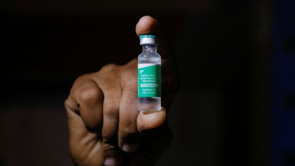 Разгрузка вакцины AstraZeneca от коронавируса в аэропорту Ганы. 24 февраля 2021 - 俄羅斯衛星通訊社