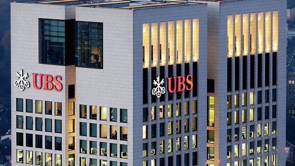 UBS Group AG -швейцарский холдинг, предоставляющий широкий спектр финансовых услуг по всему миру.  - 俄罗斯卫星通讯社