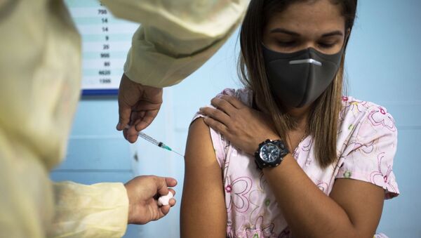 Медицинский сотрудник во время вакцинации вациной Sputnik V в одной из больниц Каракаса, Венесуэла - 俄罗斯卫星通讯社