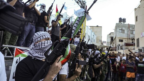 Вооруженные члены движения Фатх на митинге на Западном берегу реки Иордан - 俄罗斯卫星通讯社