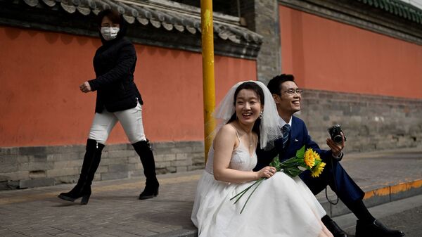 Молодожены до старта свадебной фотосессии в Пекине  - 俄羅斯衛星通訊社