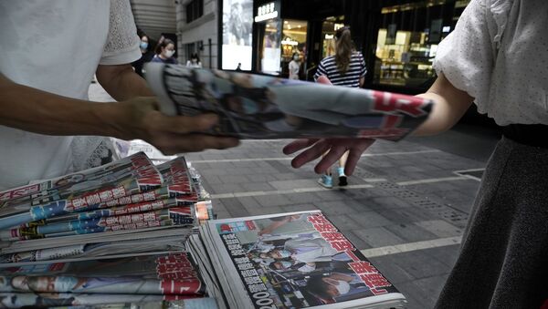Продажа газет на улице. Гонконг - 俄羅斯衛星通訊社