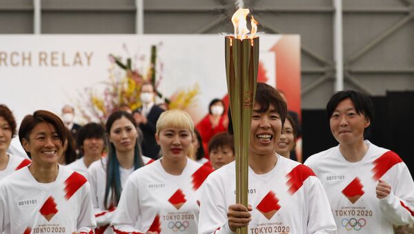 Эстафета олимпийского огня для Игр в Токио - 俄羅斯衛星通訊社