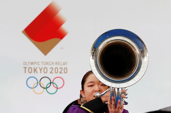 管乐长号手在奥运圣火出发式上演奏。 - 俄罗斯卫星通讯社
