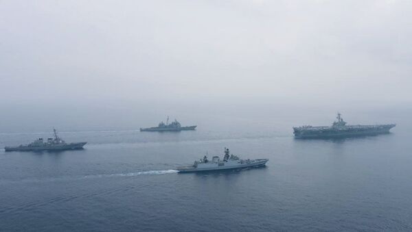 Фрегат индийских ВМС Shivalik и самолет дальней морской разведки P-8I приняли участие в прохождении авианосной ударной группы ВМС США во главе с авианосцем Theodore Roosevelt в восточной части Индийского океана.  - 俄羅斯衛星通訊社