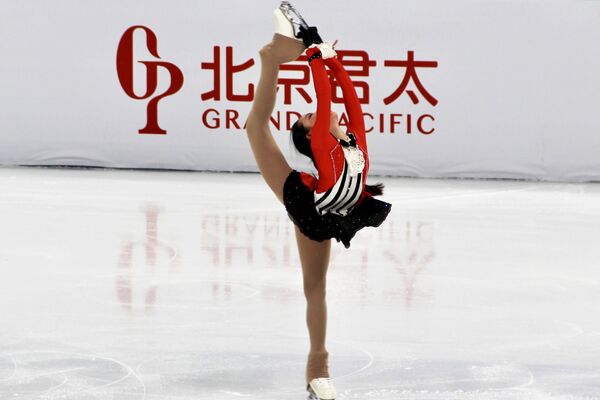 花滑运动员参加在首都体育馆举行的北京冬奥会冰上项目测试赛花样滑冰比赛。 - 俄罗斯卫星通讯社