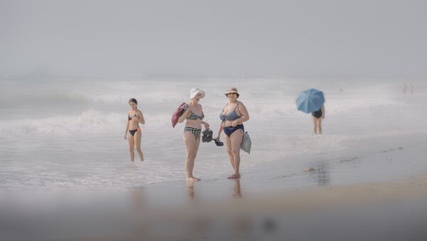 西班牙摄影师马里亚诺•贝尔玛拍摄的作品《Días de Playa》，获得公开组生活方式类别奖项。 - 俄罗斯卫星通讯社